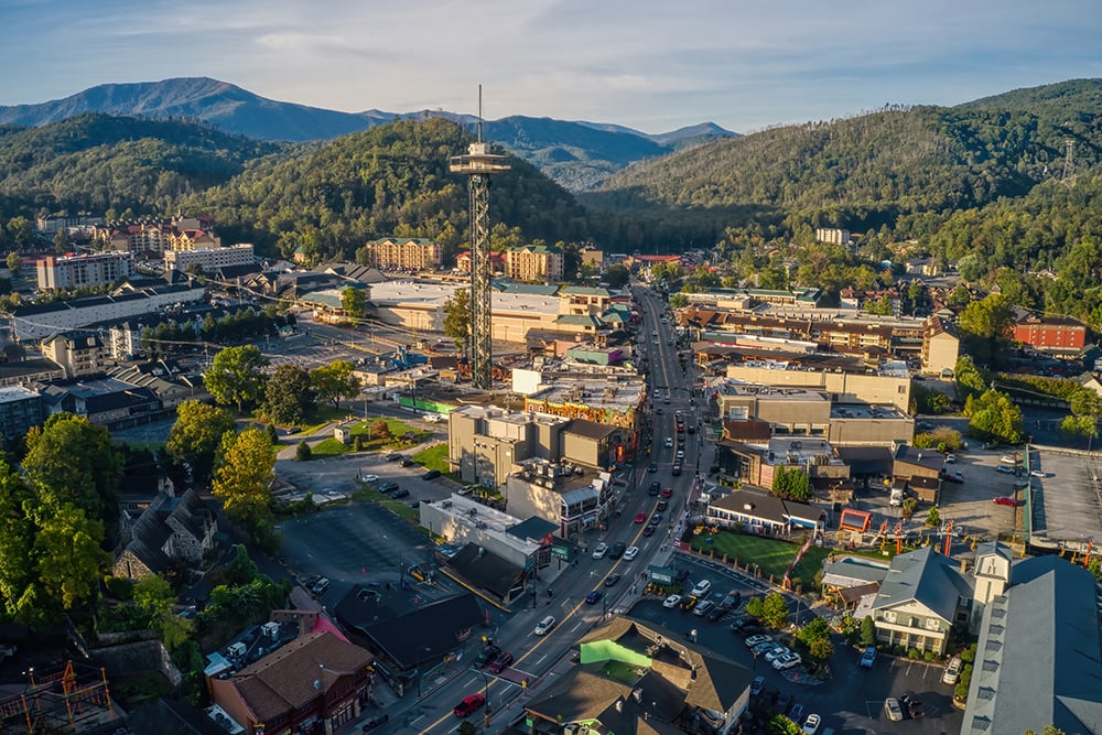 Aerial view of downtown Gatlinburg, surrounded by the Great Smoky Mountains.