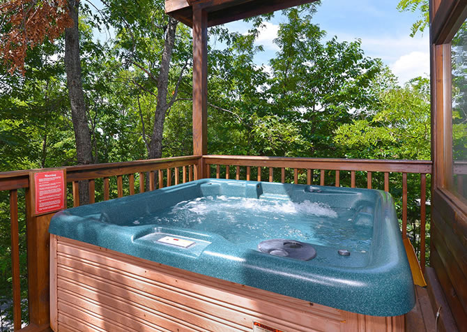 Hot Tub at A Bird's Song Cabin Rental