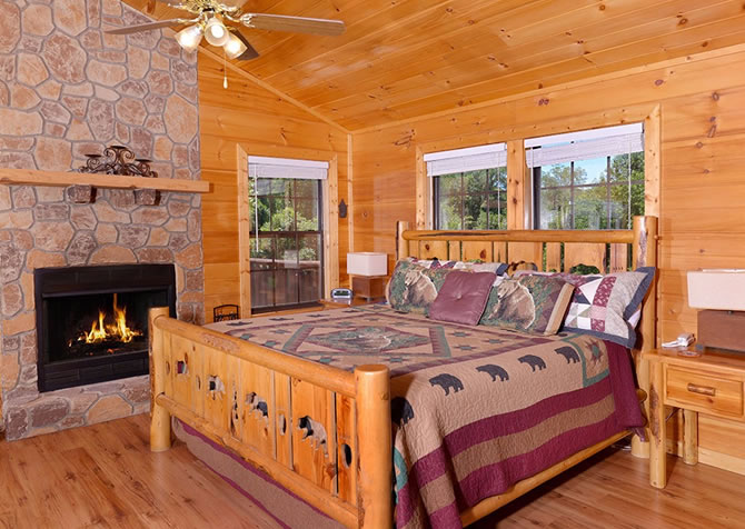 Pigeon Forge cabin rental Star Catcher bedroom with fireplace