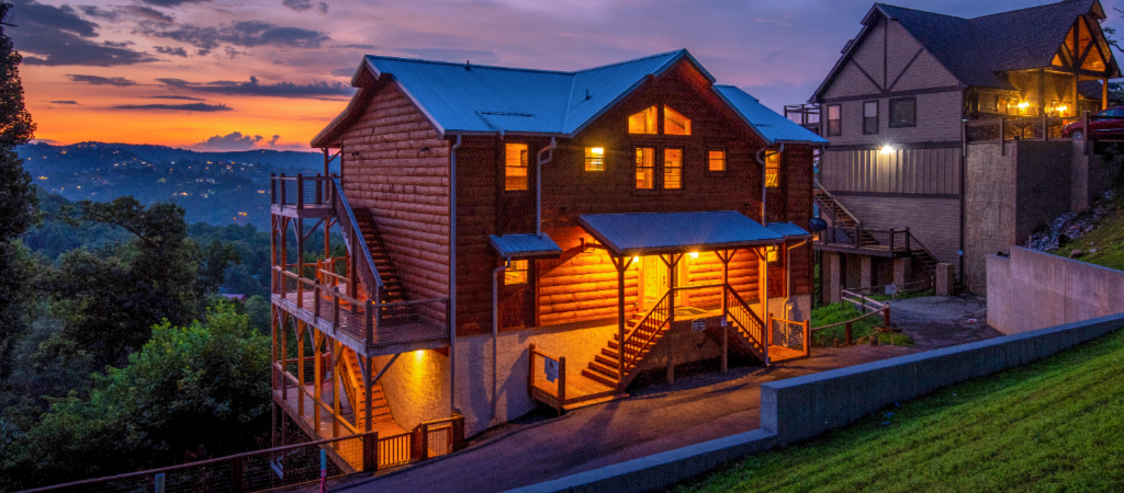 Evening Lit Gatlinburg Lodge A Gatlinburg lodge lit for evening, with sunset views of the Smokies in the background.