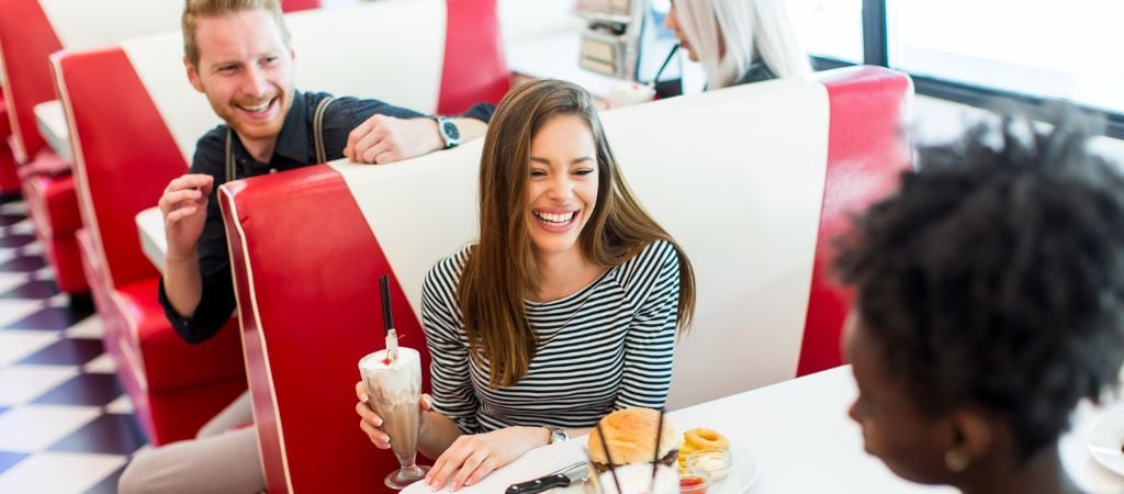 Friends Laughing at a Diner