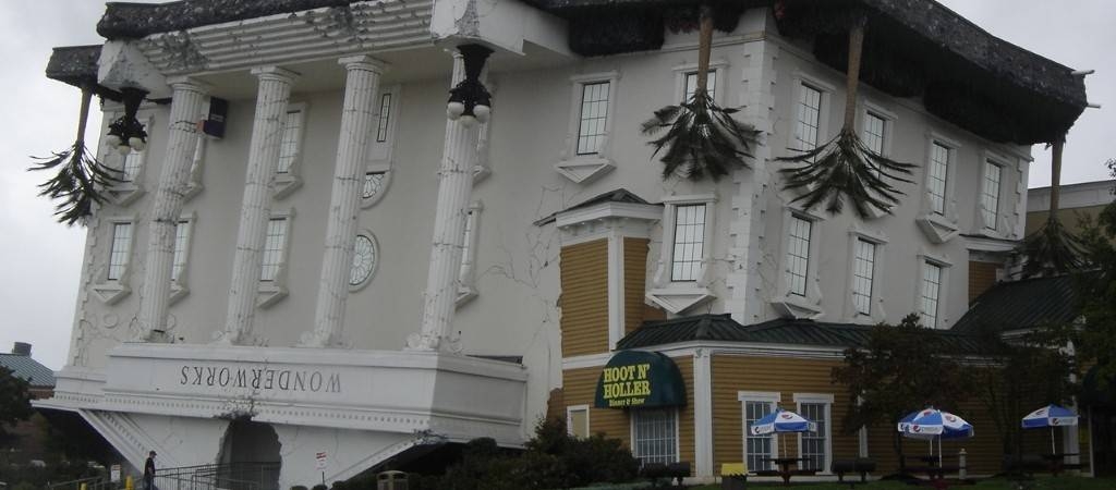 The iconic upside-down WonderWorks building in Pigeon Forge stands out as a unique indoor attraction combining science exhibits and family entertainment.